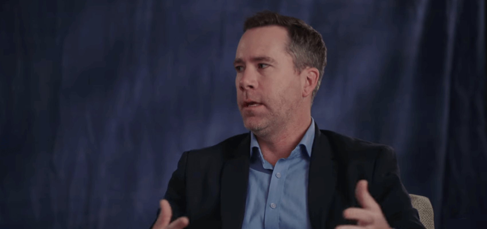 Clinician talking on video set