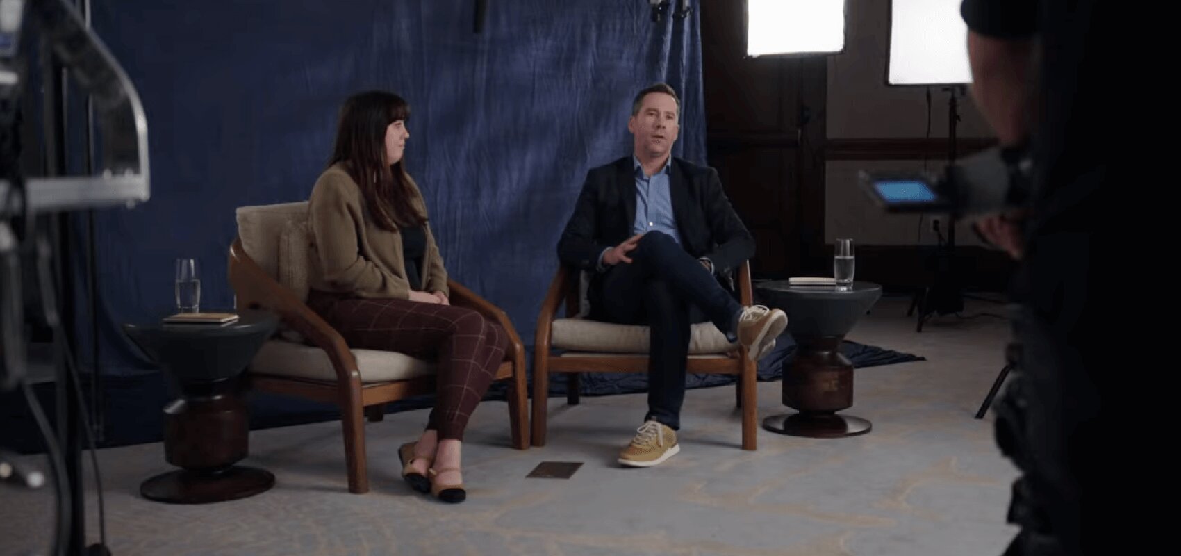 two clinicians talking on a video set